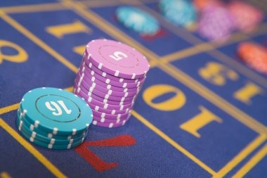Mobile app interface showing live casino tables and sports markets